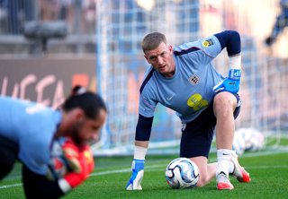 03 October 2026, Croatia, Rijeka: England goalkeeper Jordan Pickford warms up ahead of the UEFA Nations League Group A3 soccer match between Croatia and England at the Stadion HNK Rijeka. Photo: Bradley Collyer/PA Wire/dpa