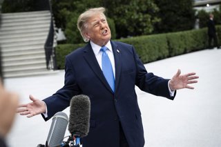 October 3, 2026, Washington, District Of Columbia, USA: United States President Donald J Trump speaks to members of the media before boarding Marine One on the South Lawn of the White House, in Washington, DC, USA, 3 October 2026. President Trump is trave