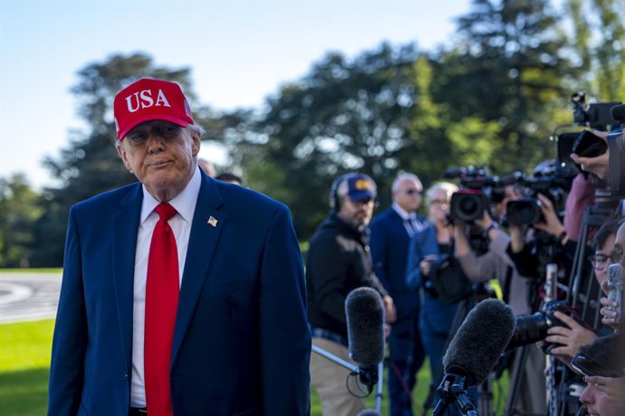 October 6, 2026, Washington, District Of Columbia, USA: United States President Donald J Trump speaks with reporters on the South Lawn of the White House in Washington, DC, USA, as he returns to the White House from speaking in Baltimore, Maryland on Tues