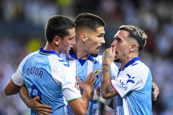 Archivo - Los jugadores del Málaga CF celebran un gol en LaLiga EA Sports 26-27