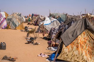 TAWILA, Oct. 5, 2026  -- This photo taken with a mobile phone on Oct. 5, 2026 shows tents sheltering displaced people who have recently fled to the area in Tawila, Sudan. TO GO WITH "Roundup: Displaced families pour into Sudan's Tawila as challenges hinde
