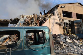 October 5, 2026, Kharkiv, Ukraine: Rescuers of the State Emergency Service of Ukraine work to eliminate the aftermath of a Russian air strike on a motor transport enterprise, Kharkiv, Ukraine, on October 5, 2026. Russian forces attacked the city with thre