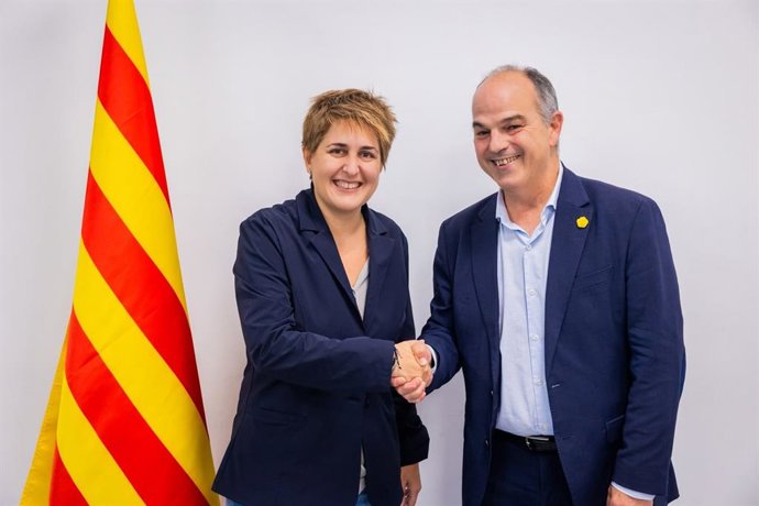 El secretari general de Junts, Jordi Turull, amb la secretària general del PNC, Marta Pascal