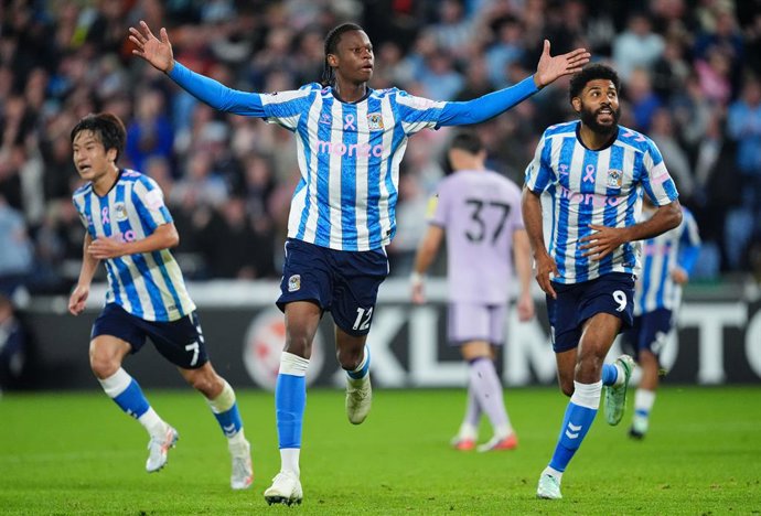 12 October 2026, United Kingdom, Coventry: Coventry City's Stephen Mfuni celebrates scoring his side's fourth goal of the game during the English Premier League match between Coventry City and Newcastle United at the Coventry Building Society Arena. Photo