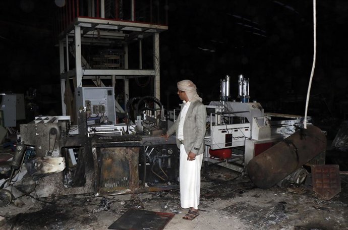 SANAA, Oct. 4, 2026  -- A worker inspects a sponge factory after it was struck by an airstrike carried out by a Saudi warplane in Sanaa, Yemen, on Oct. 4, 2026. Yemen's Houthi group said Sunday that Saudi Arabia had launched 106 air and missile strikes ac
