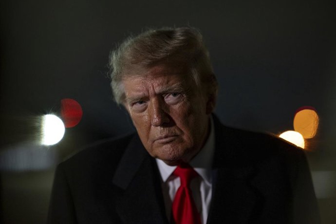 October 14, 2026, Clinton, Md, United States of America: U.S. President Donald Trump speaks to the press pool after arriving via Air Force One to Joint Base Andrews, October 10, 2026 in Clinton, Maryland. Trump returned from a campaign rally for GOP candi