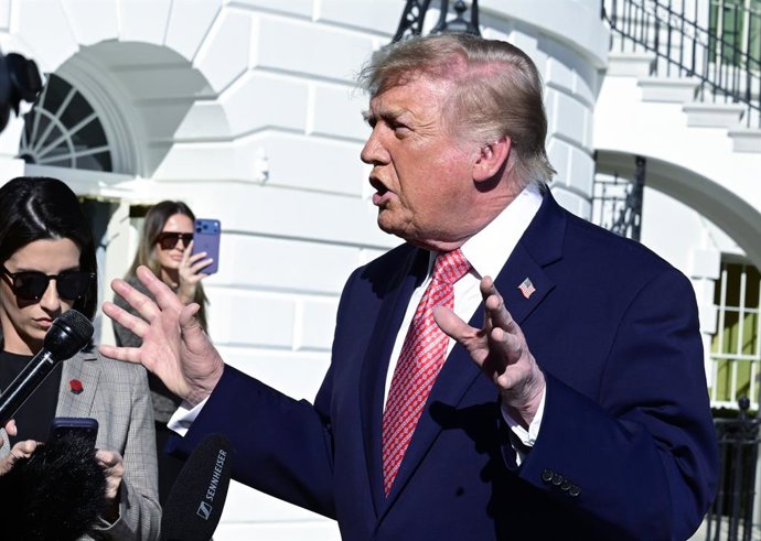 October 19, 2026, Washington, District Of Columbia, USA: United States President Donald J Trump speaks to the media prior to departing the South Lawn of the White House in Washington, DC, USA, on Monday, October 19, 2026.  The President is traveling to Wi