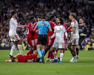 October 18, 2026, Madrid, Madrid, Spain: Players of both teams (from L to R) Jude Bellingham, Chidera Ejuke, Juan Iglesias, Marc Cucurella, Dean Huijsen against referee Mateo Busquets Ferrer during the LaLiga EA Sports football match between Real Madrid C