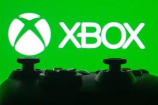 October 11, 2026, Canada: In this photo illustration, the Xbox logo is displayed on a computer screen, next to an Xbox video game controller.