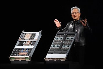 21 October 2026, Berlin: Jensen Huang, co-founder and CEO of Nvidia, speaks in front of the Nvidia Vera Rubin NVL72 computer (L) and the Vera MGX Compute Node during GTC Berlin. The US chipmaker is hosting its AI conference from October 20 to 22, 2026. Ph