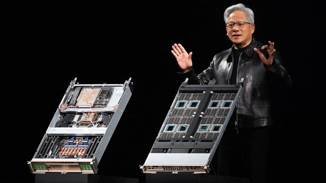 21 October 2026, Berlin: Jensen Huang, co-founder and CEO of Nvidia, speaks in front of the Nvidia Vera Rubin NVL72 computer (L) and the Vera MGX Compute Node during GTC Berlin. The US chipmaker is hosting its AI conference from October 20 to 22, 2026. Ph