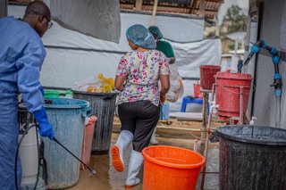 KINSHASA, Oct. 21, 2026  -- Medical workers carry out disinfection work at an Ebola treatment center in Bunia, capital of Ituri Province in the Democratic Republic of the Congo (DRC), on Oct. 18, 2026.   The Africa Centers for Disease Control and Preventi