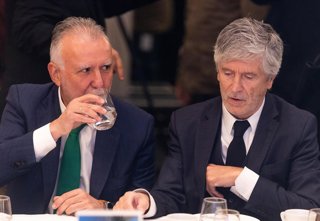 El ministro de Política Territorial y Memoria Democrática, Ángel Víctor Torres, y el ministro de Interior, Fernando Grande Marlaska, durante un desayuno informativo de Fórum Europa, a 23 de octubre de 2026, en Madrid (España).