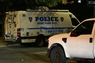 October 15, 2026, Queens, New York, USA: NYPD officers gather evidence from the home where a 5-year-old girl died after she was discovered bleeding from her nose and mouth inside the bedroom of 95-24 110 Street within the confines of the 102 precinct in Q
