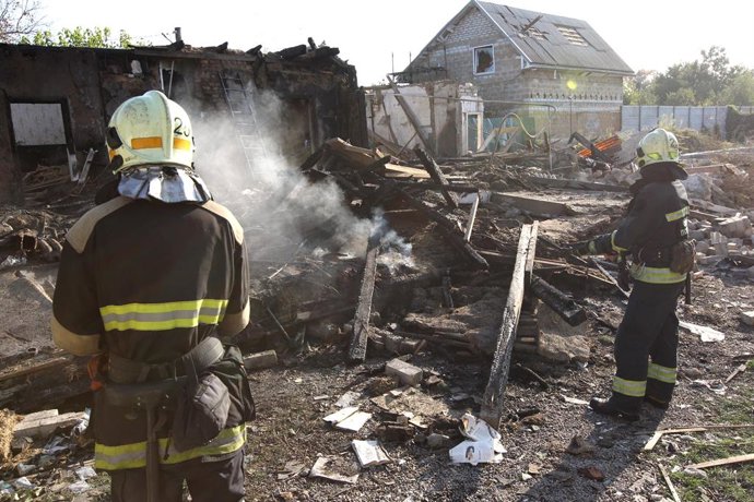 October 24, 2026, Dnipro, Ukraine: Rescuers extinguish a fire caused by a Russian attack drone that struck a residential building in Dnipro, Ukraine, October 24, 2026. Russian forces targeted a residential area of the city with a drone. One person was kil
