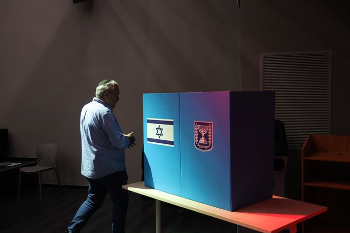 October 27, 2026, West Jerusalem, Israel: WEST JERUSALEM, OCTOBER 27, 2026: Israeli President Isaac Herzog and voters cast their ballots at a polling station in West Jerusalem during elections for Israel's parliament, the Knesset.