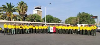 Archivo - Un equipo de emergencia de México viaja a Canadá para hacer frente a los incendios forestales